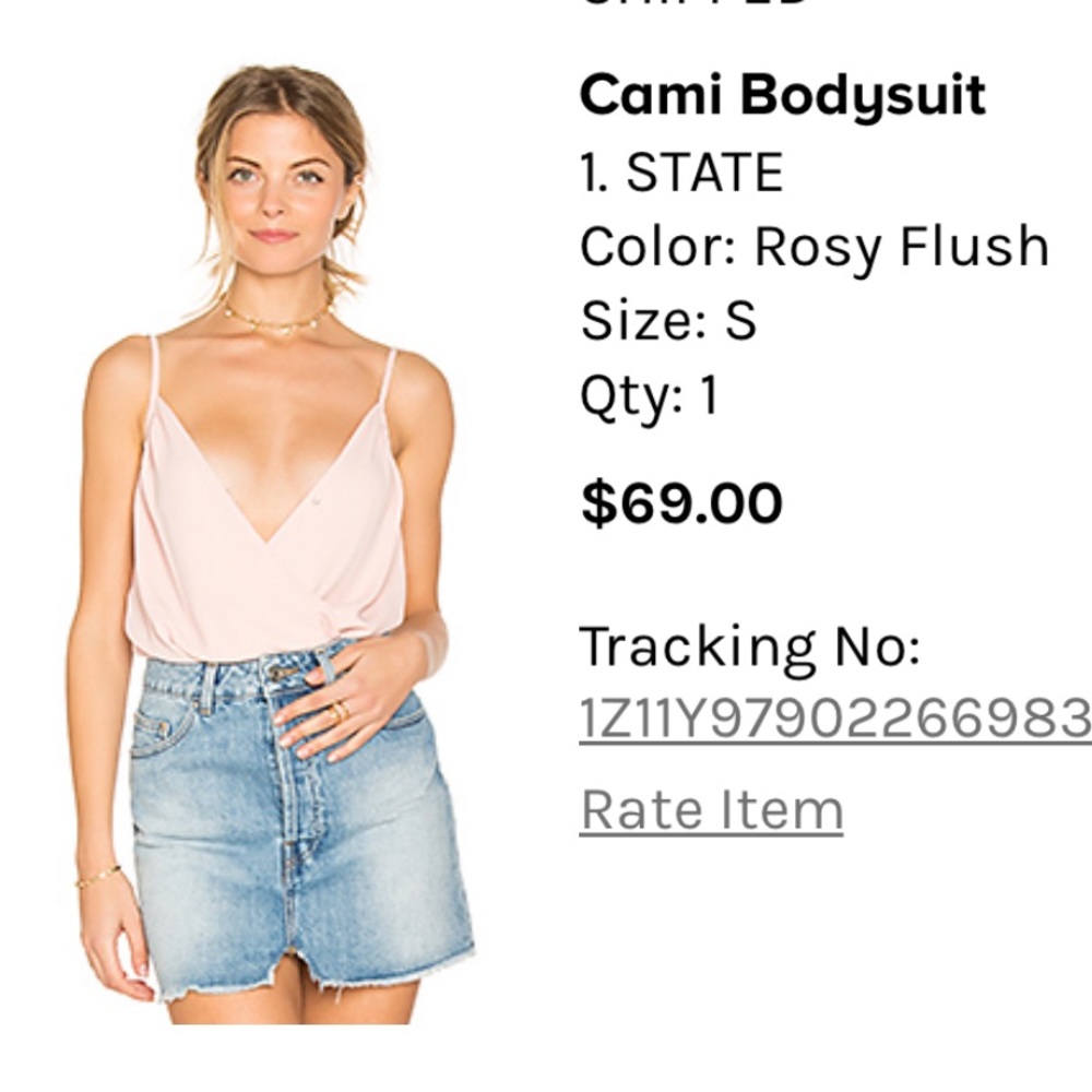 Pink revolve bodysuit